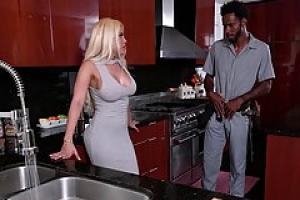 Latin whore with blonde hair is having an interracial sex session with a black guy