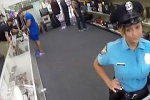 Super hot police lady is about to suck a rock hard meat stick while kneeling on the floor