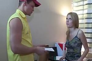 Blonde teen spread her legs on the couch and got fucked  by a guy who delivered a pizza