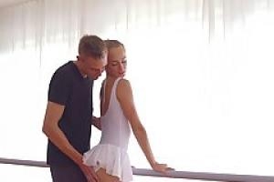 Sweet ballerina is being banged from behind  by a horny fitness trainer  in the dance studio