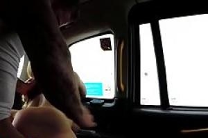 Handsome taxi driver is getting a blowjob in the back of his car and loving it