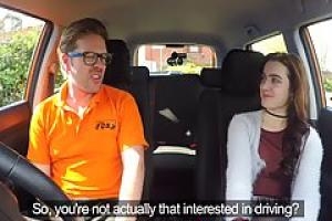 Instead of having a driving class  naughty teen brunette is getting fucked in the car