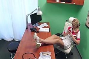 Horny blonde doctor with big tits is getting fucked in her office  instead of doing her job